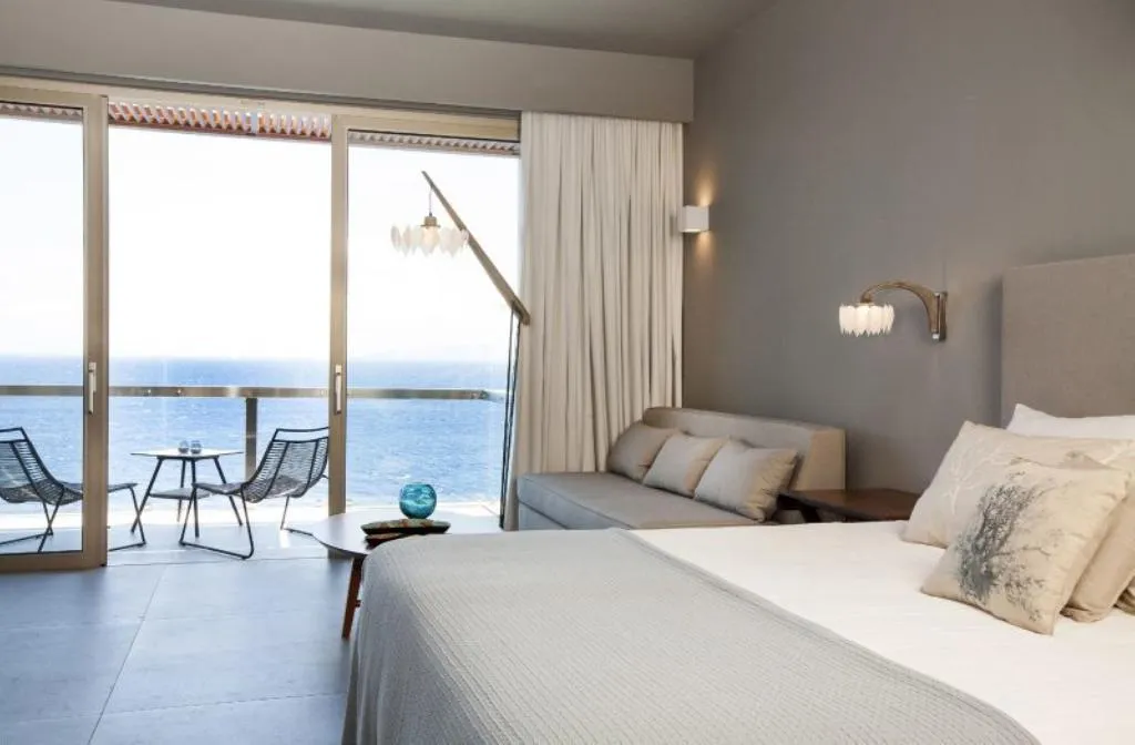 SUITE DELUXE SEA FRONT Room, Aquila Elounda Village Resort, suites & spa, Crete