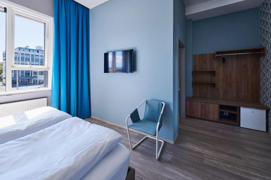TRIPLE TWO BEDS Room, Oddsson Hotel, Reykjavik
