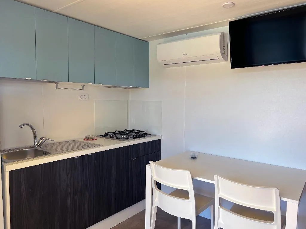 MOBILE HOME TWO BEDROOMS ONE BATHROOM Room, Camping Village Capo D'Orso, Olbia