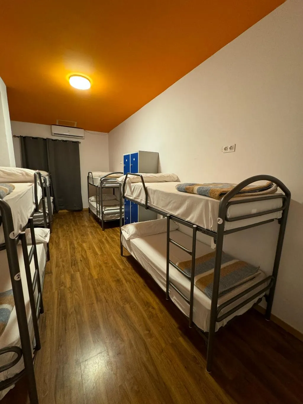 Bed in dormitory STANDARD Room, Arc House Pop Art, Madrid