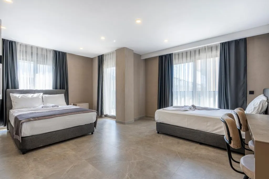 FAMILY ROOM CAPACITY 7 TWO BEDROOMS Room, Lara Beach Homes, Antalya