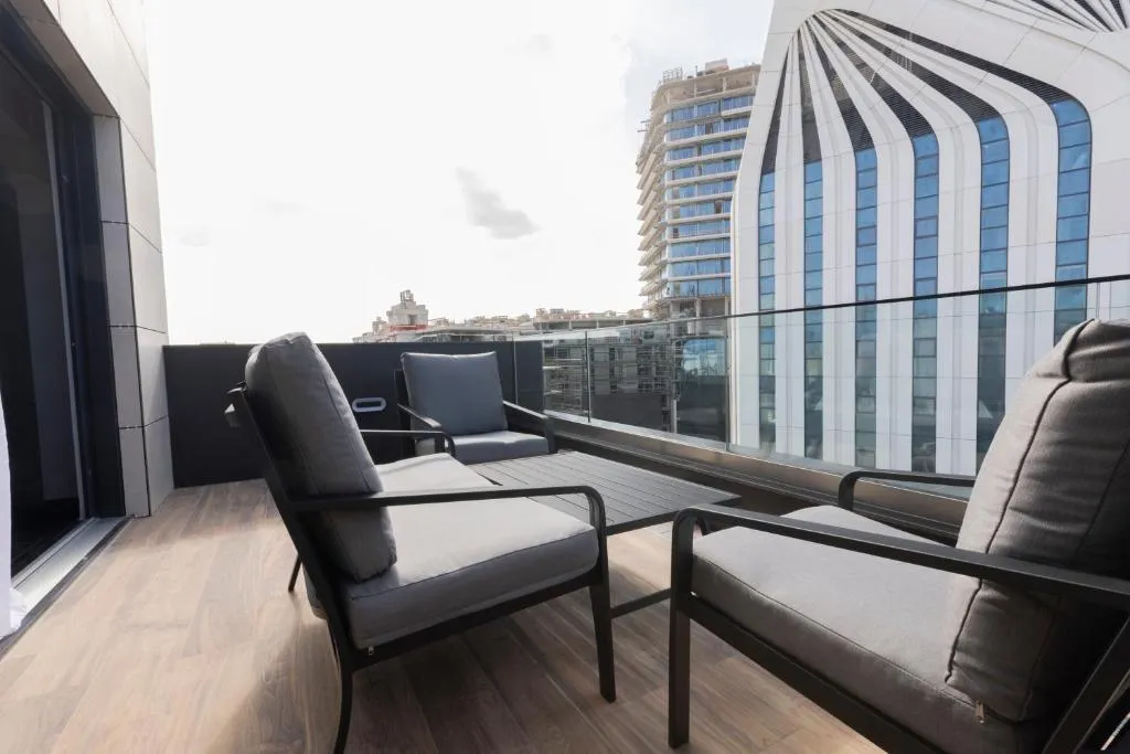 JUNIOR SUITE CITY VIEW Room, The Londoner Hotel St. Julians, Malta