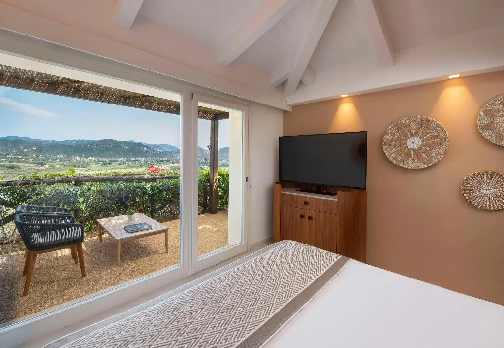DOUBLE DELUXE LAGOON VIEW Room, Baia di Chia Resort Sardinia, Curio Collection, Cagliari