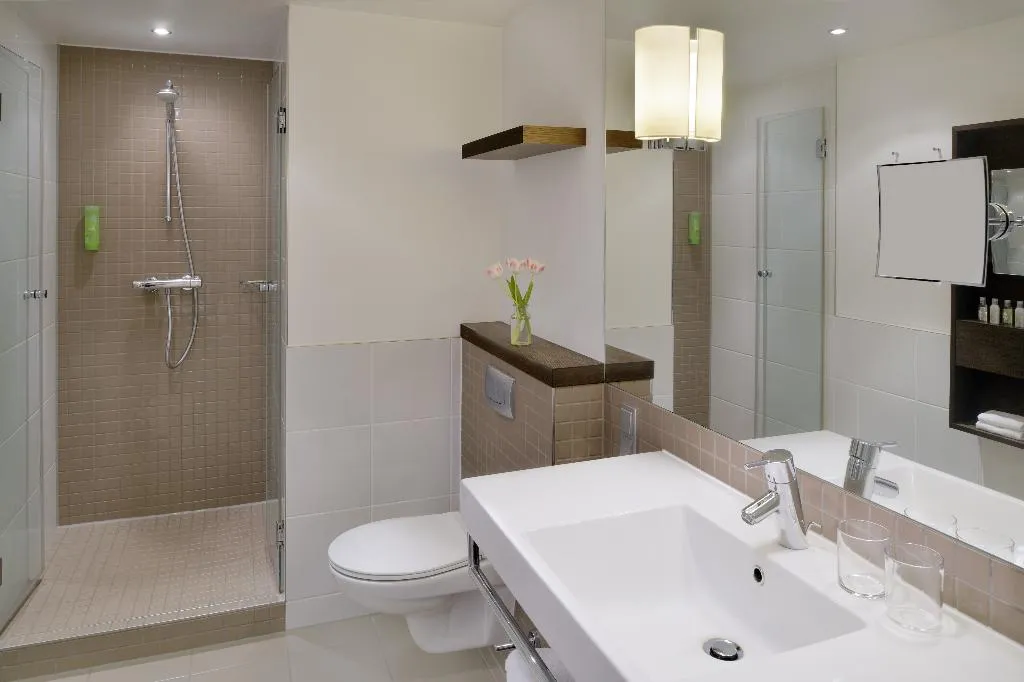JUNIOR SUITE KING SIZE BED Room, Movenpick Hotel Amsterdam City Centre, Amsterdam