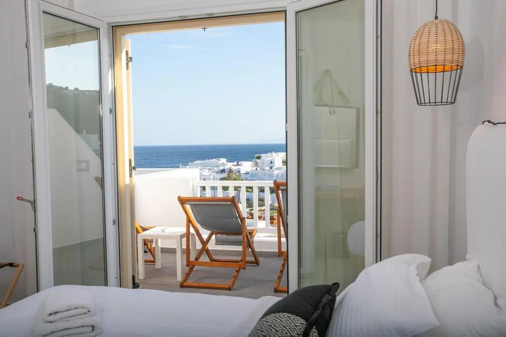QUADRUPLE DELUXE SEA VIEW Room, The George Hotel, Mykonos