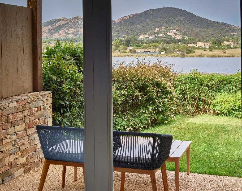 FAMILY ROOM DELUXE LAGOON VIEW Room, Baia di Chia Resort Sardinia, Curio Collection, Cagliari
