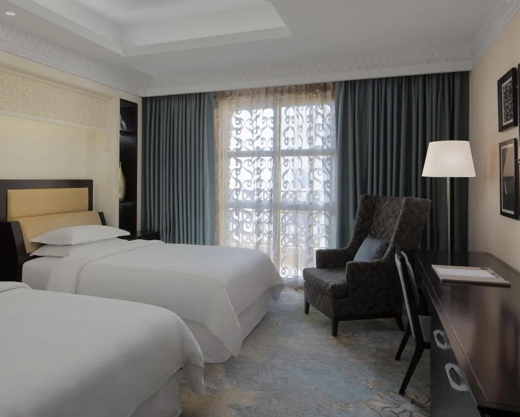 QUADRUPLE DELUXE TWO DOUBLE BEDS Room, Sheraton Sharjah Beach Resort & Spa, Dubai