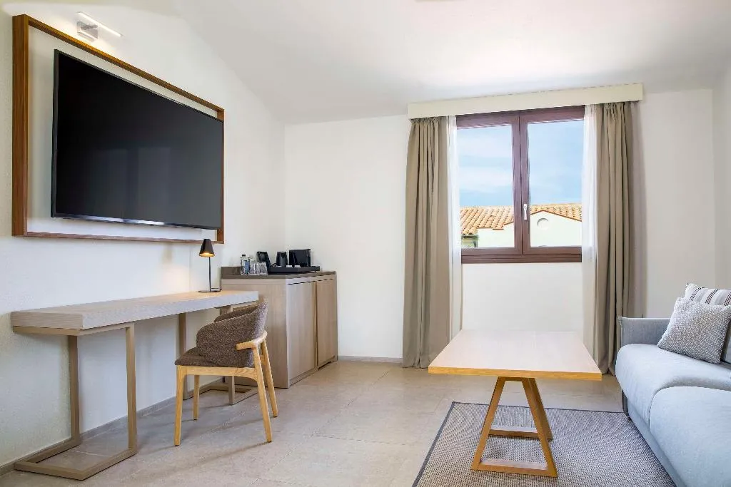 SUITE KING BED ONE BEDROOM  Room, Mangia's Santa Teresa Sardinia, Curio Collection, Olbia