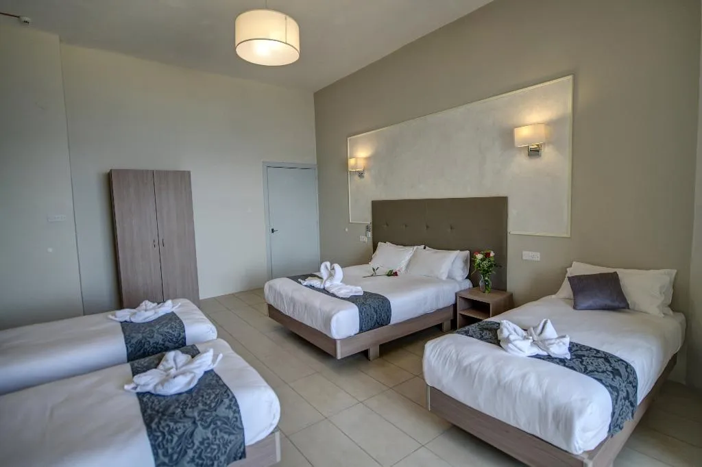 QUADRUPLE STANDARD Room, Europa Hotel Malta, Malta