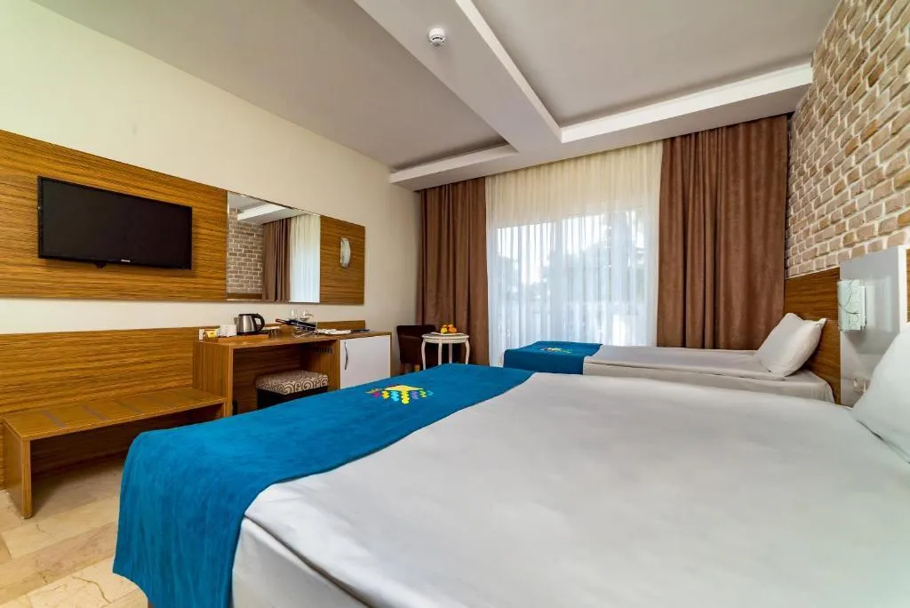 DOUBLE SINGLE USE GARDEN VIEW Room, Amara Comfort Resort, Antalya