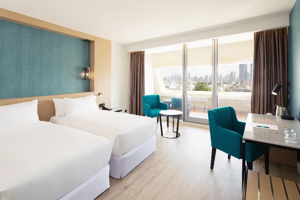 Double or Twin DELUXE CITY VIEW Room, Occidental Sharjah Grand, Dubai