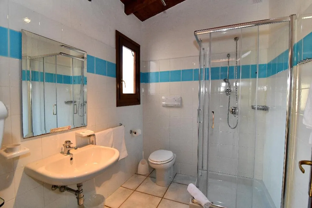 QUADRUPLE COMFORT Room, Li Suari Club Village, Olbia