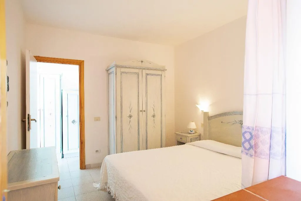 APARTMENT CAPACITY 6 TWO BEDROOMS Room, Porto Coda Cavallo Residence, Olbia