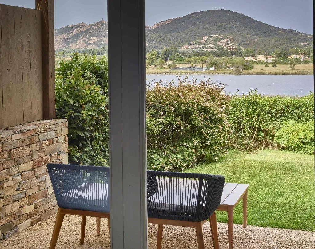 FAMILY ROOM DELUXE LAGOON VIEW Room, Baia di Chia Resort Sardinia, Curio Collection, Cagliari