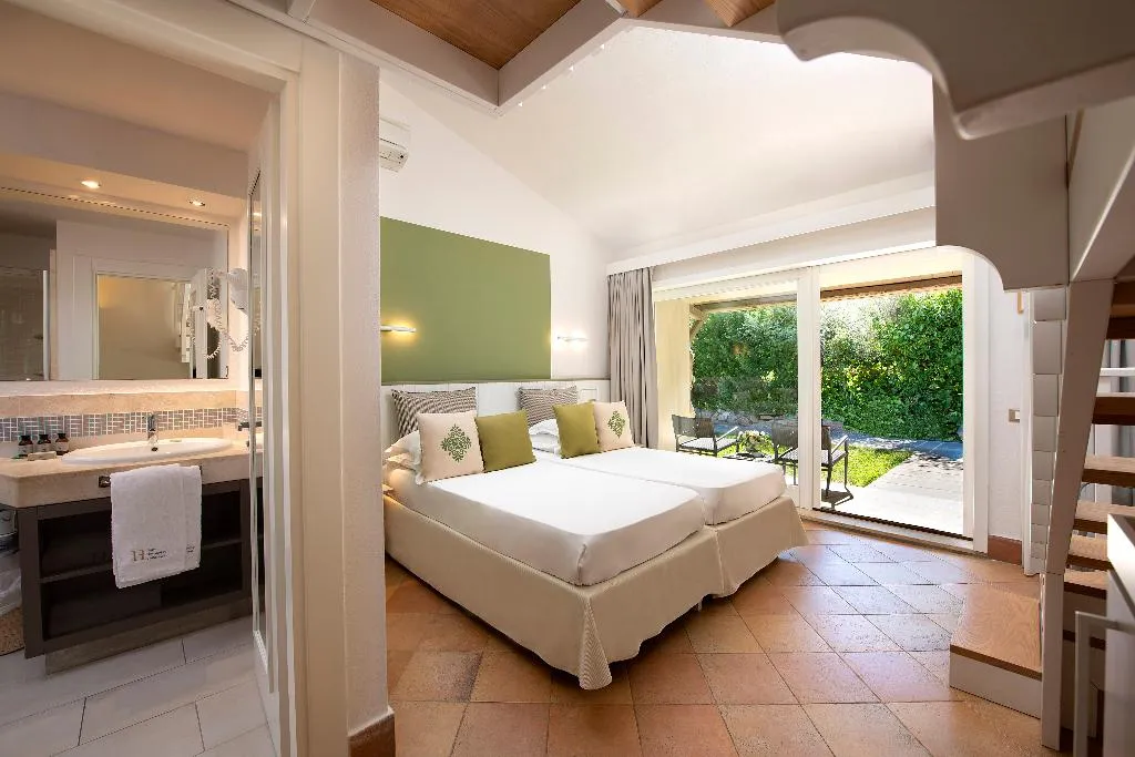 FAMILY ROOM GARDEN VIEW Room, The Village Chia Laguna Sardinia, Cagliari