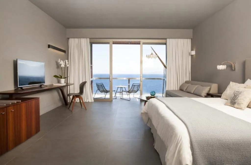 SUITE DELUXE SEA FRONT Room, Aquila Elounda Village Resort, suites & spa, Crete