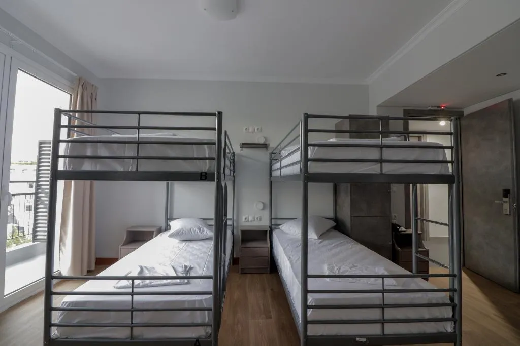 Bed in dormitory FEMALE ROOM Room, Athens Hawks, Athens