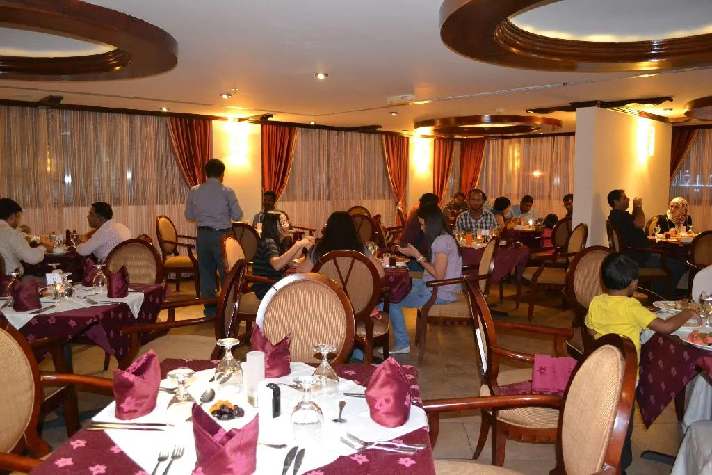 Restaurant, Sunday Sharjah Aparthotel Formerly Royal Tulip, Dubai
