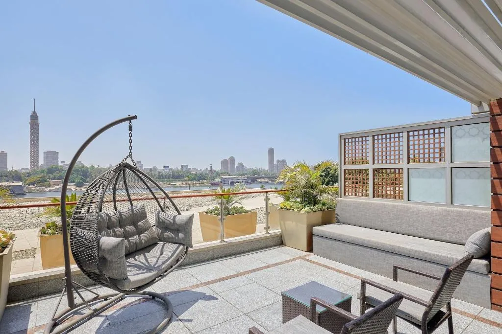 QUADRUPLE DELUXE SMOKING Room, The Nile Ritz-Carlton, Cairo, Cairo