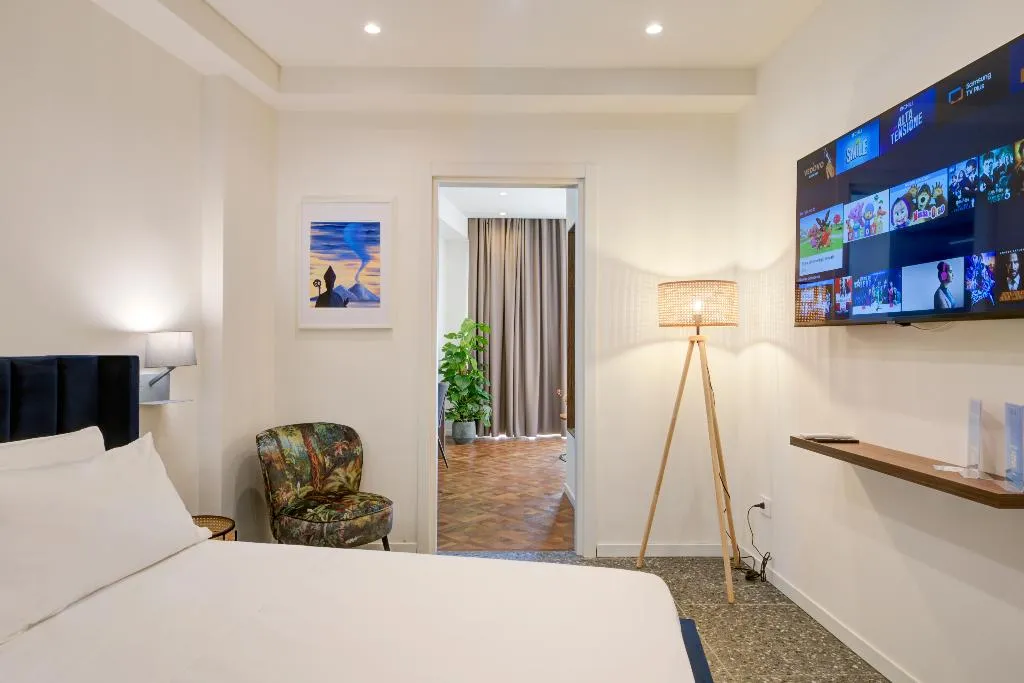 SUITE DELUXE WITH BALCONY Room, Well Suites - Piazza dei Martiri, Naples