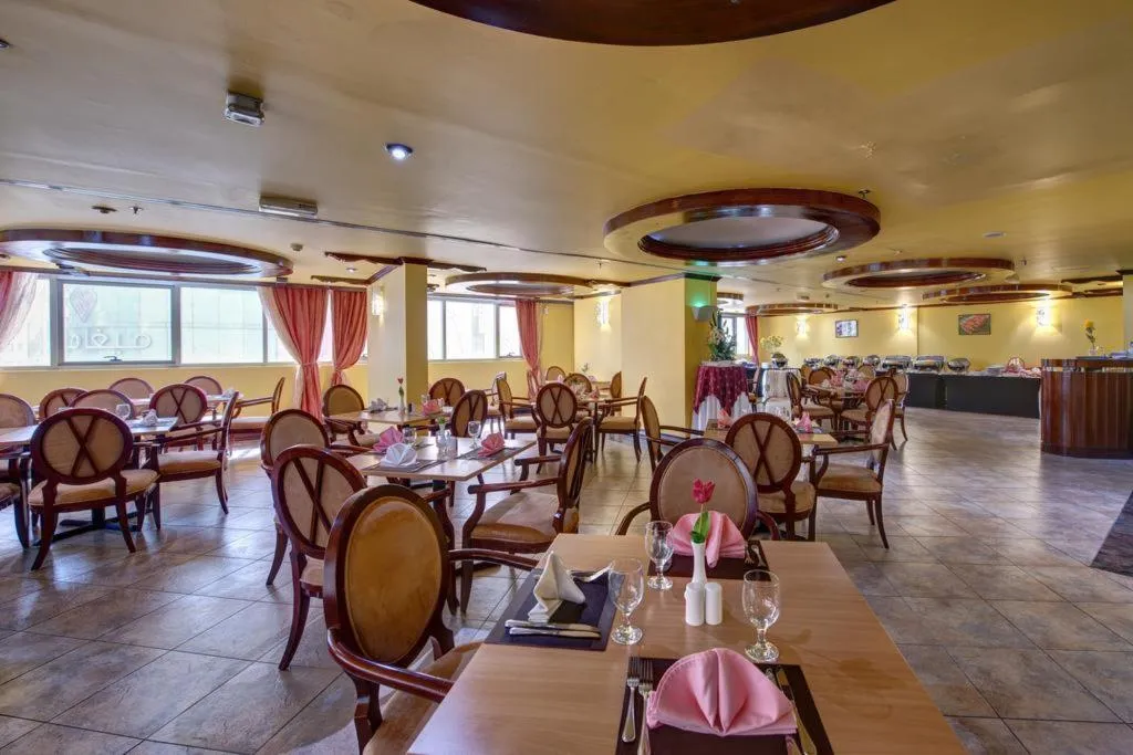 Restaurant, Sunday Sharjah Aparthotel Formerly Royal Tulip, Dubai