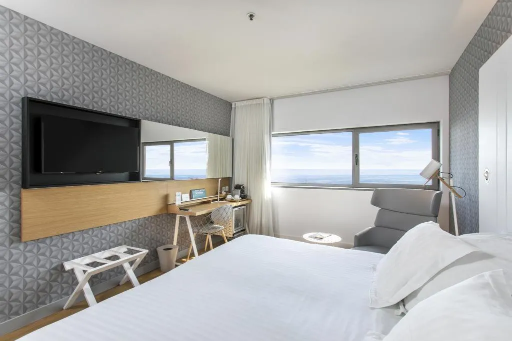 DOUBLE SINGLE USE DELUXE Room, Occidental Atenea Mar, Barcelona