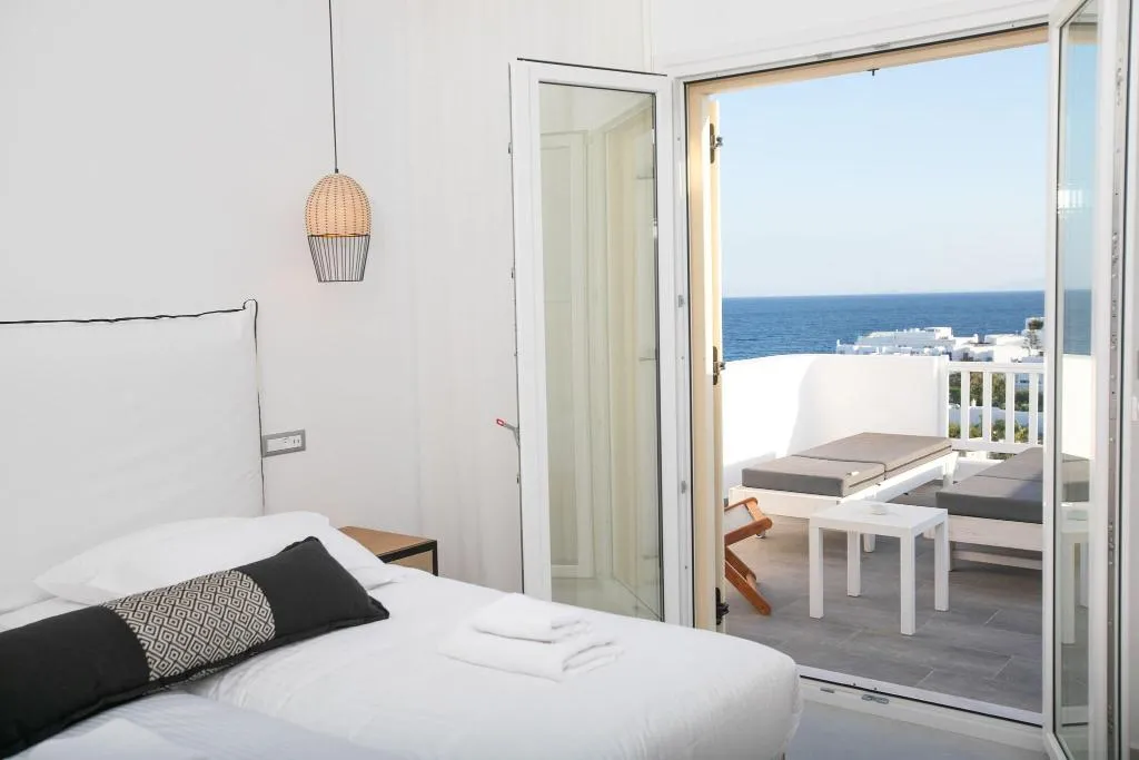 QUADRUPLE DELUXE SEA VIEW Room, The George Hotel, Mykonos