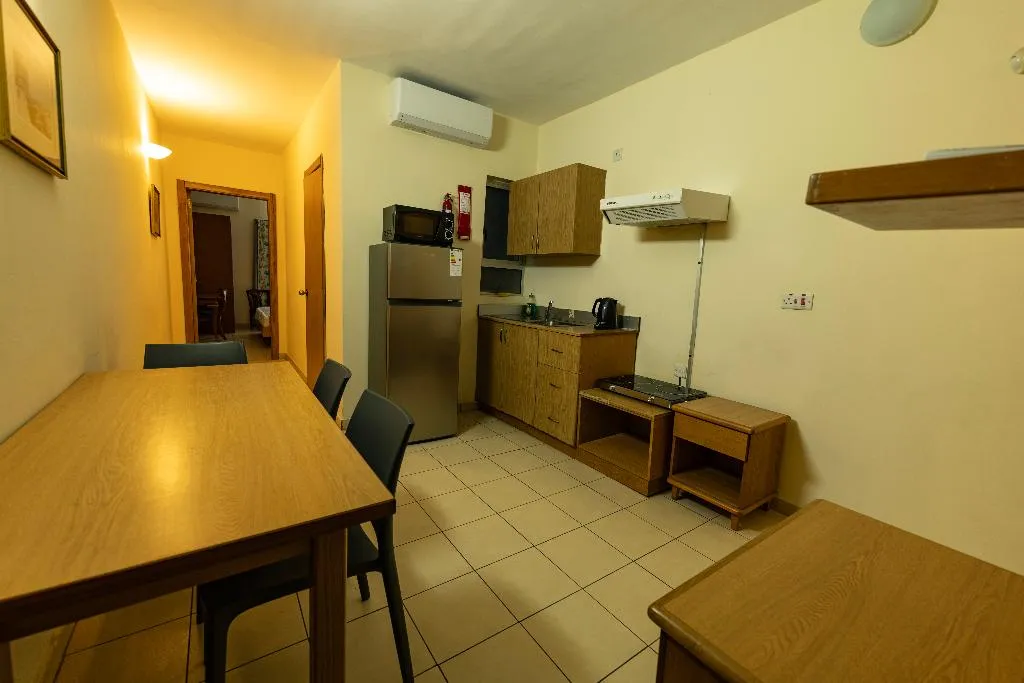 APARTMENT CAPACITY 4 TWO BEDROOMS Room, Qawra Point Holiday Complex, Malta