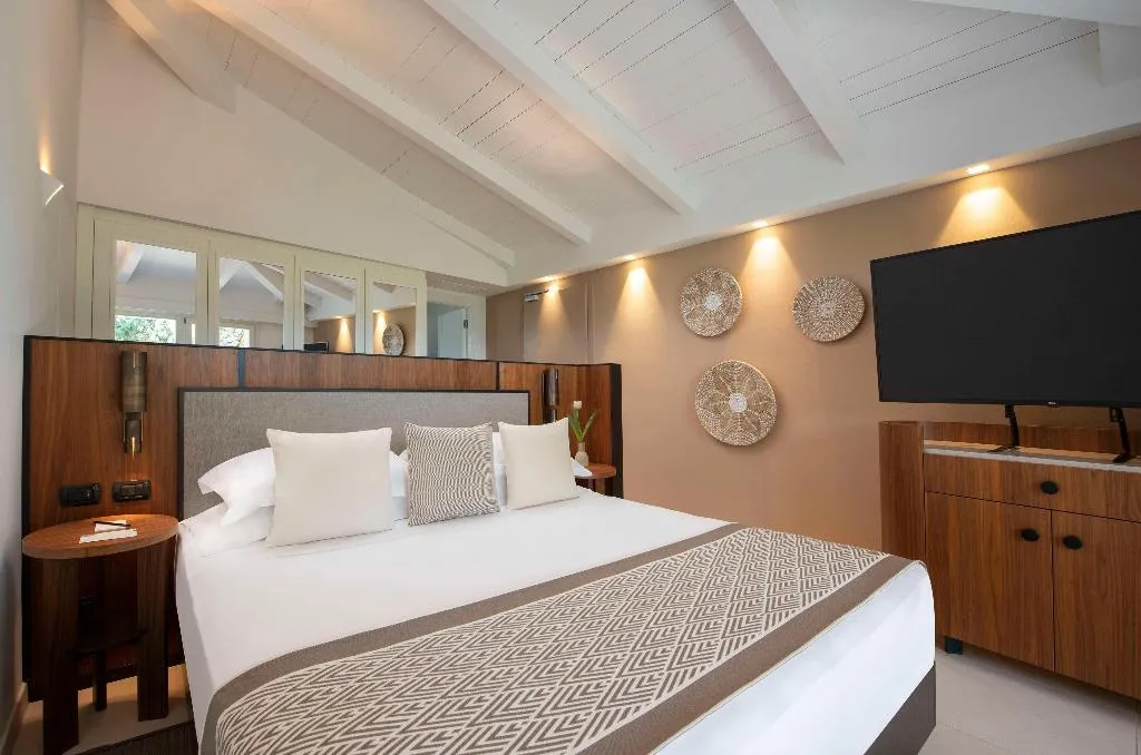 DOUBLE DELUXE SEA VIEW Room, Baia di Chia Resort Sardinia, Curio Collection, Cagliari