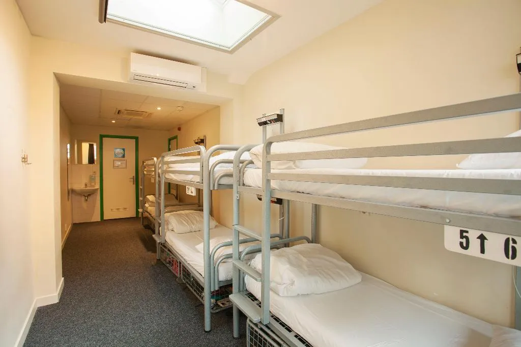 Bed in dormitory STANDARD Room, Flying Pigs Uptown Hostel Amsterdam, Amsterdam
