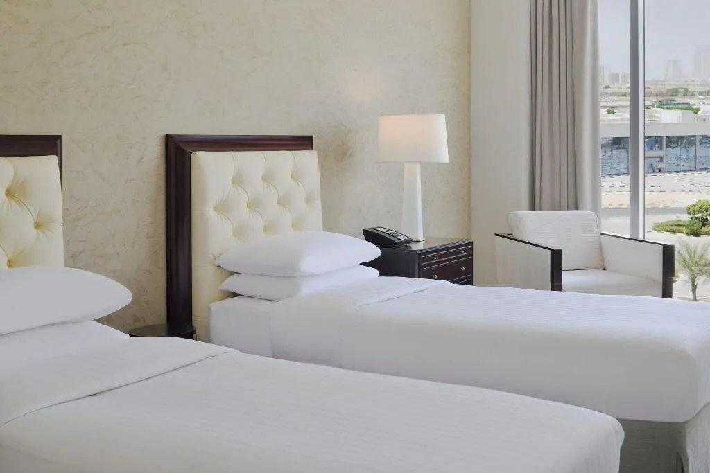 QUADRUPLE EXECUTIVE 2 DOUBLE BEDS Room, Delta Hotels By Marriott, Dubai Investment Park, Dubai