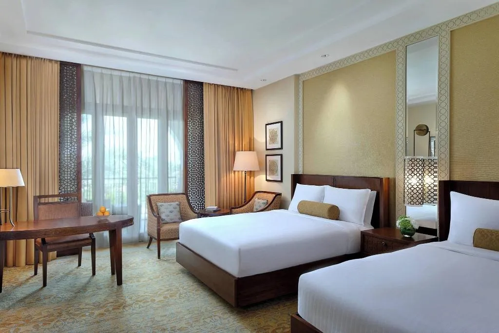 QUADRUPLE DELUXE GARDEN VIEW Room, The Ritz-Carlton, Dubai, Dubai
