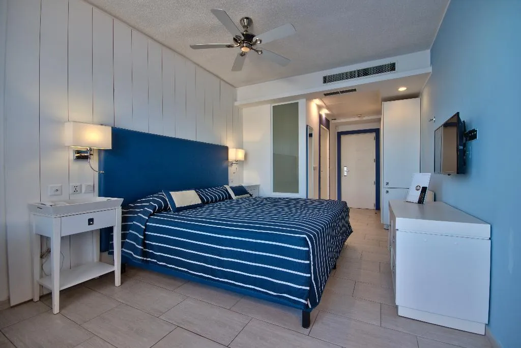 SINGLE POOL VIEW Room, db Seabank Resort + Spa – All Inclusive, Malta